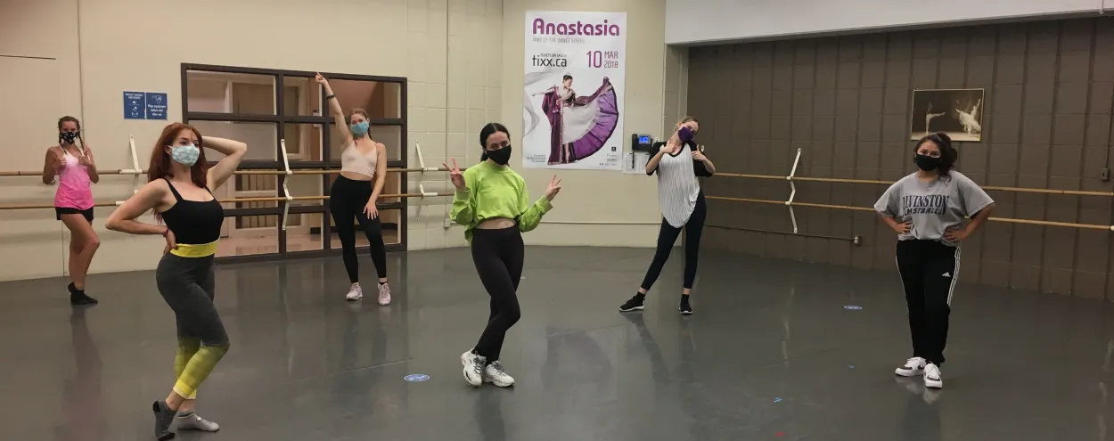 Dance students wearing masks in studio