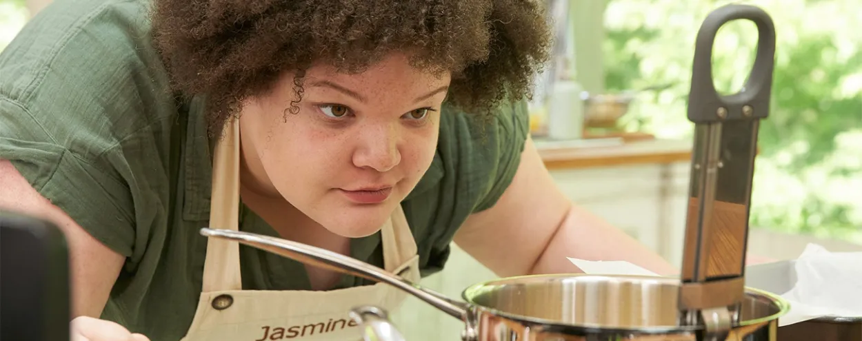 Jasmine Linton looking at thermometer