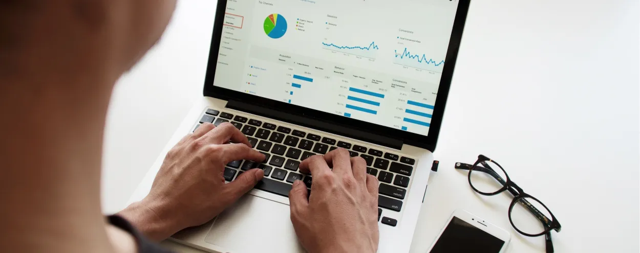 Woman typing on a laptop