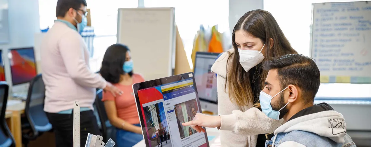2 students at desktop computer