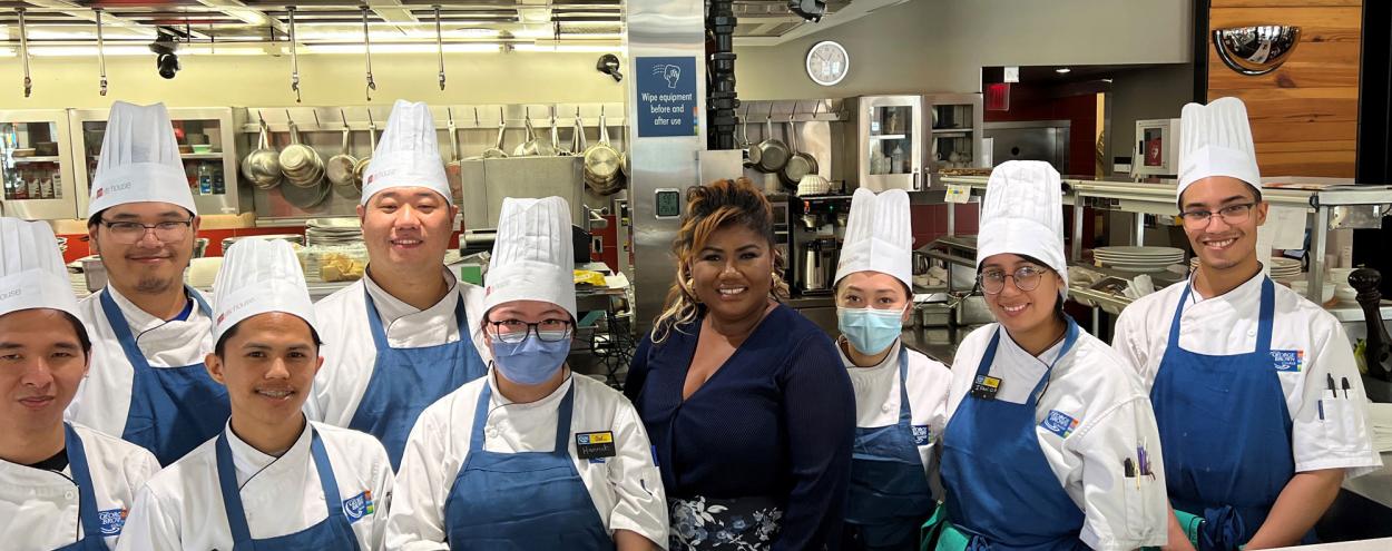 Chef Raquel Fox poses with students from GBC's Culinary Arts program.