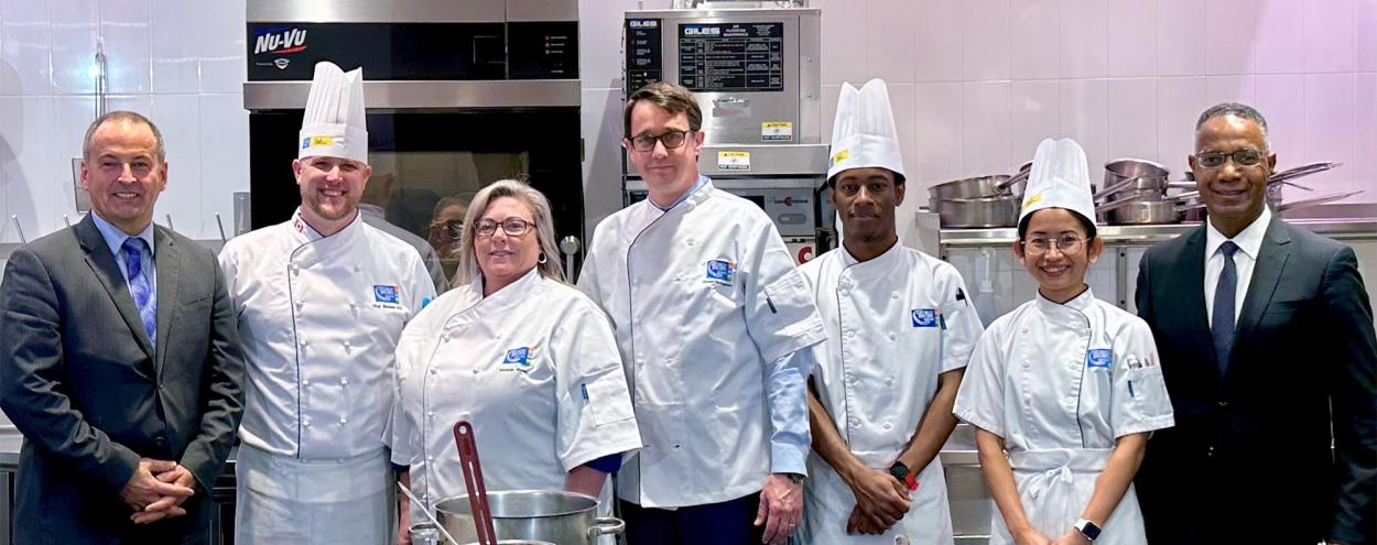 Skilled Trades Ontario CEO Melissa Young, Minister of Labour, Immigration, Training and Skills Development Monte McNaughton and GBC President Dr. Gervan Fearon with CHCA students and Dean Rudi Fischbacher