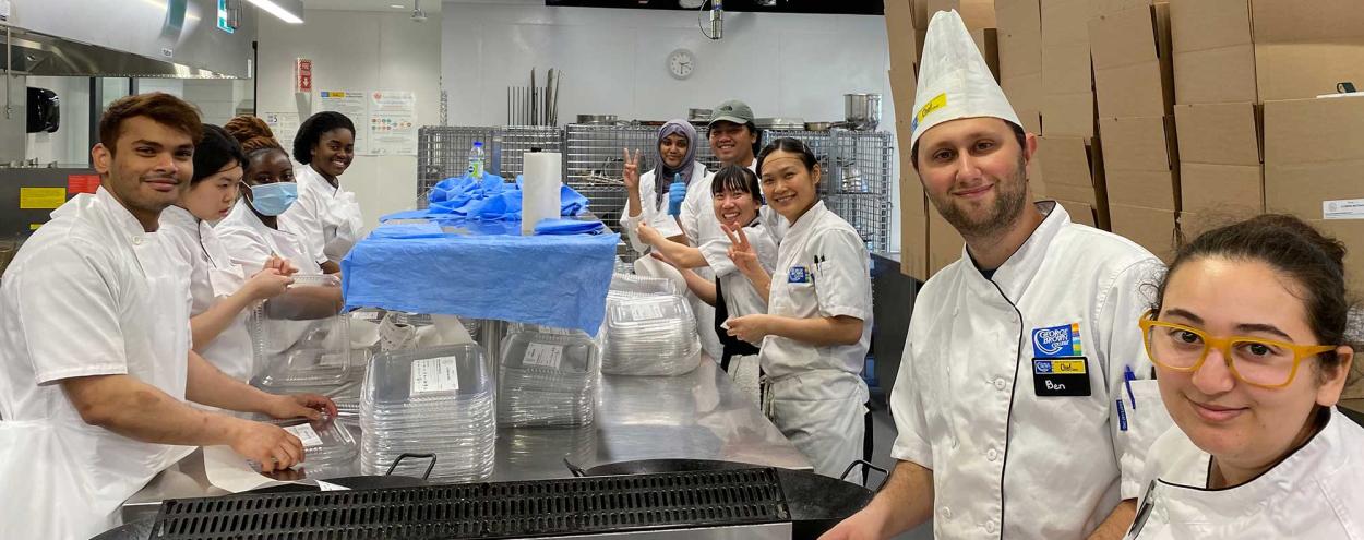 Chef School student volunteers packaging Second Harvest food donations