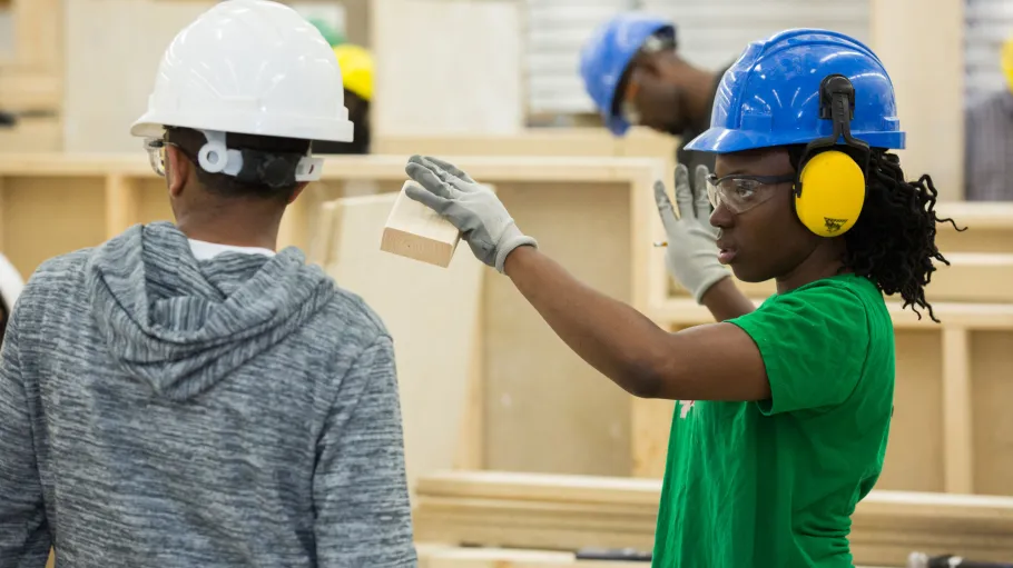 Trades students working in the shop. 
