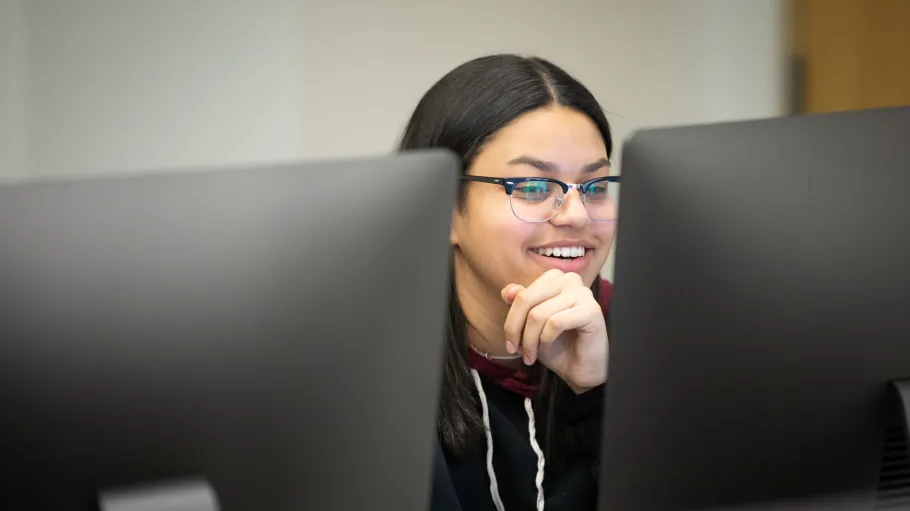 Student using a desktop computer
