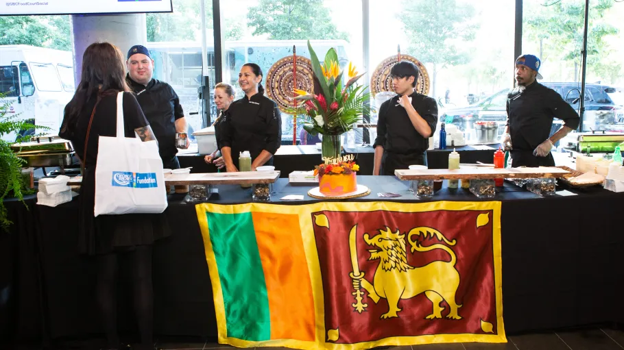 Woman at a stall at Food Court Social event