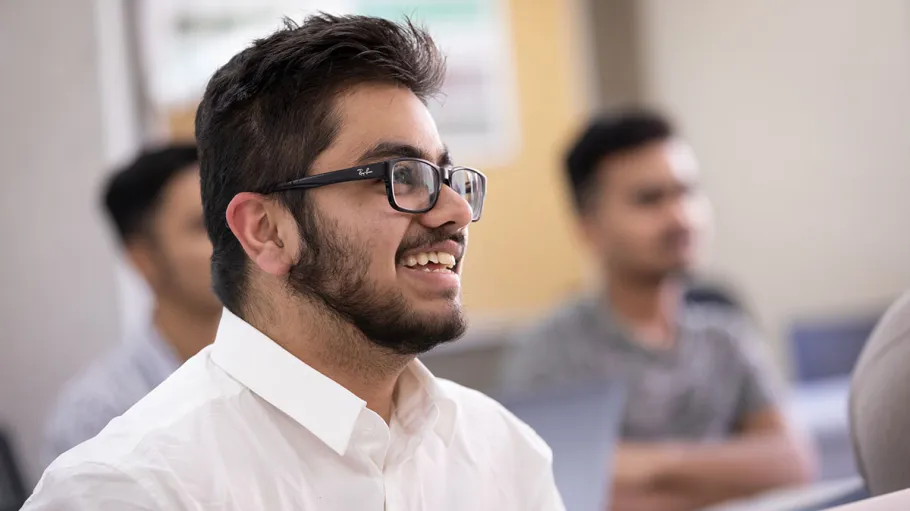 smiling student in class