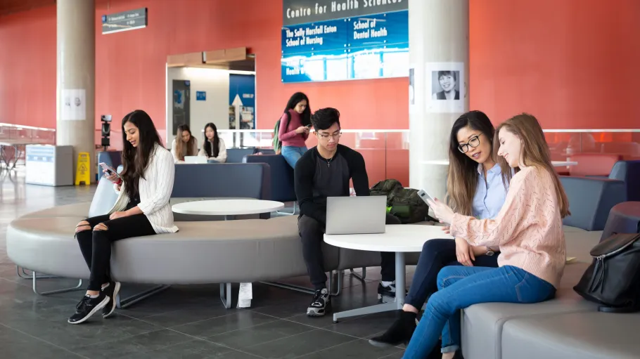 Students sitting on couches at Waterfront campus