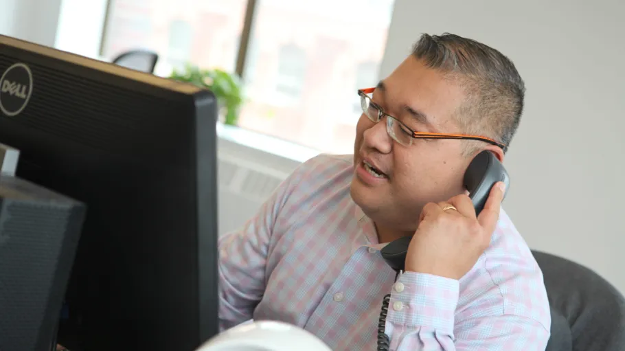 Employee speaking on the phone