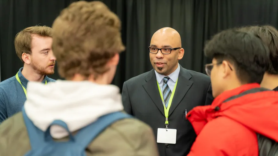 A photo of employers talking to GBC students during an open house