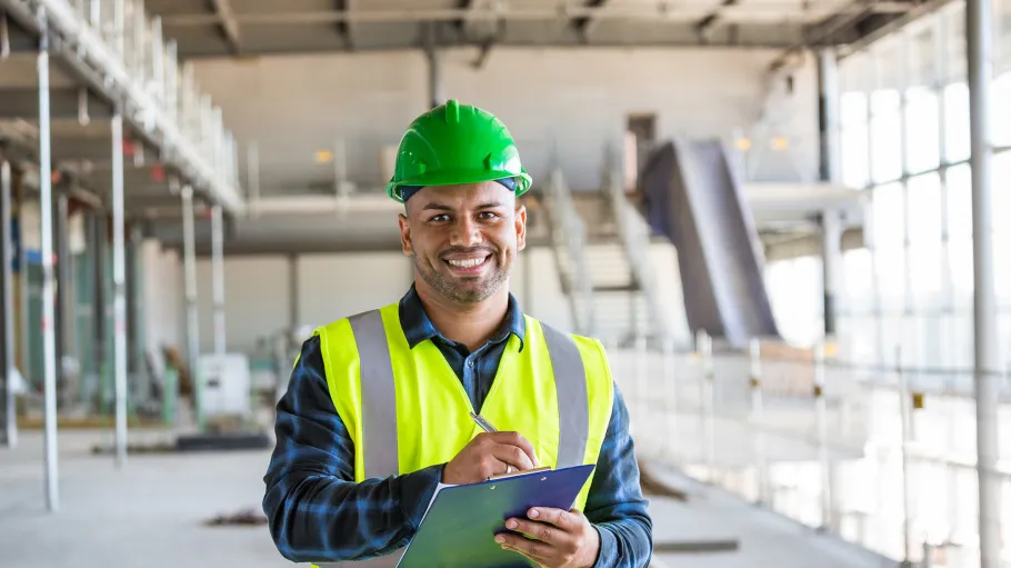 Trades management student on a building site