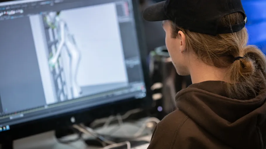 A student works on a computer 