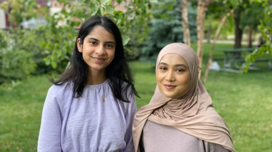 Raisa Chowdhury, left, and Fatheha Rahim, right, are pictured in Regent Park. Both are youth leads with the group Youth Empower Youth.