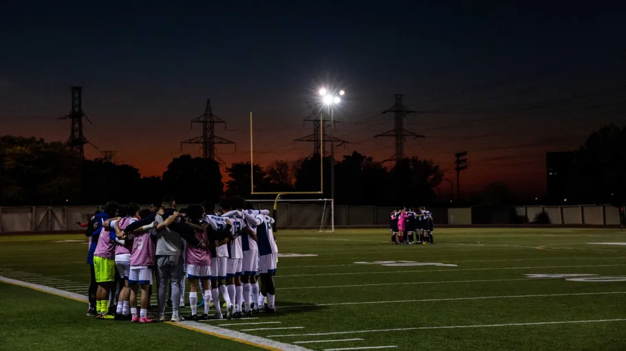 OCAA men's soccer team on the field, October 2022