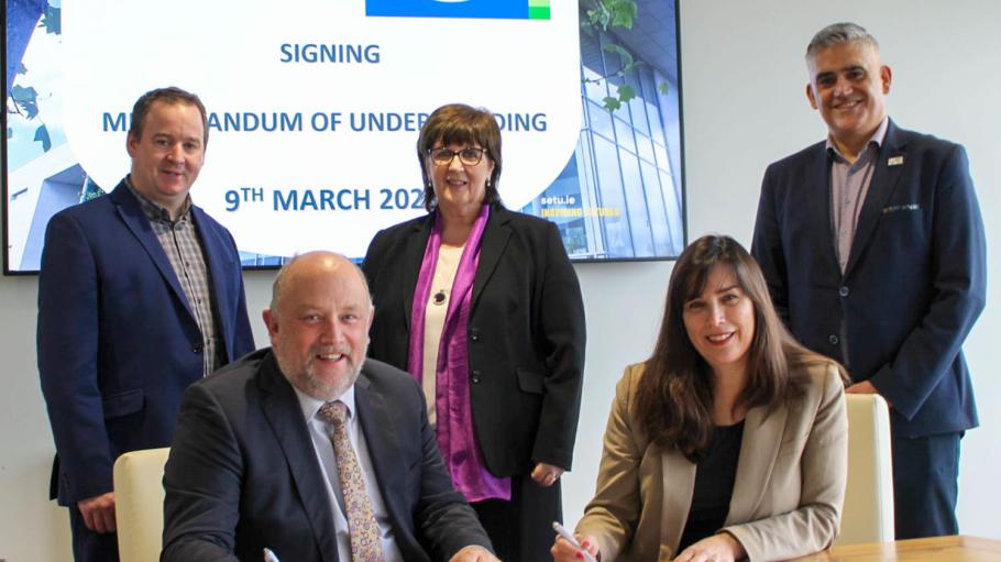 Dr. Eileen De Courcy signs MOU with South East Technological University in Ireland, March 2023