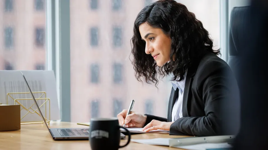 Woman working at a computer