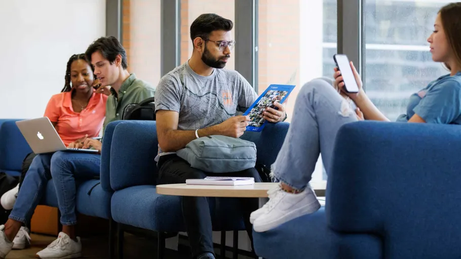 4 students in lounge area