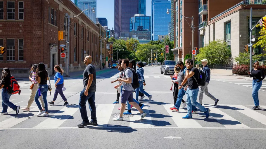 Students on a tour walking across Adelaide Street at the crosswalk.