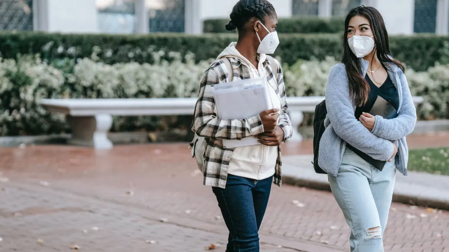 Students walking wearing face masks