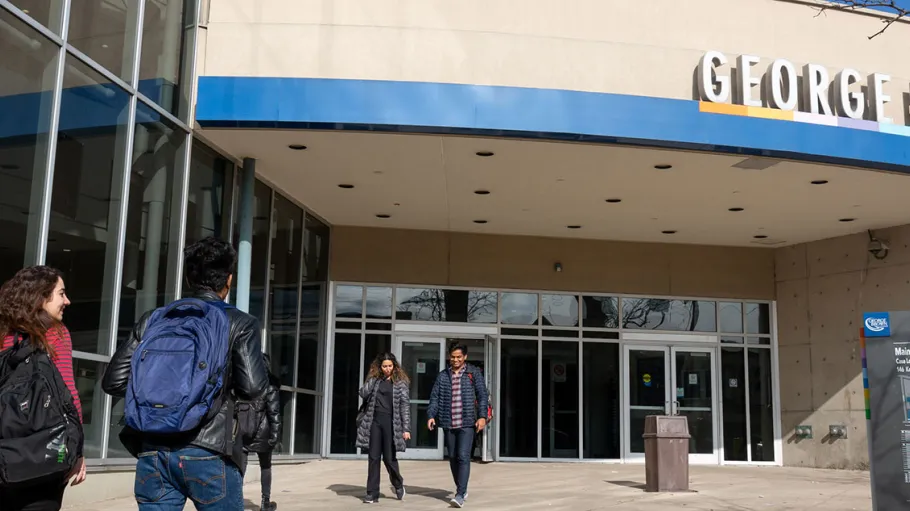 Students walking up to the entrance of Casa Loma Campus