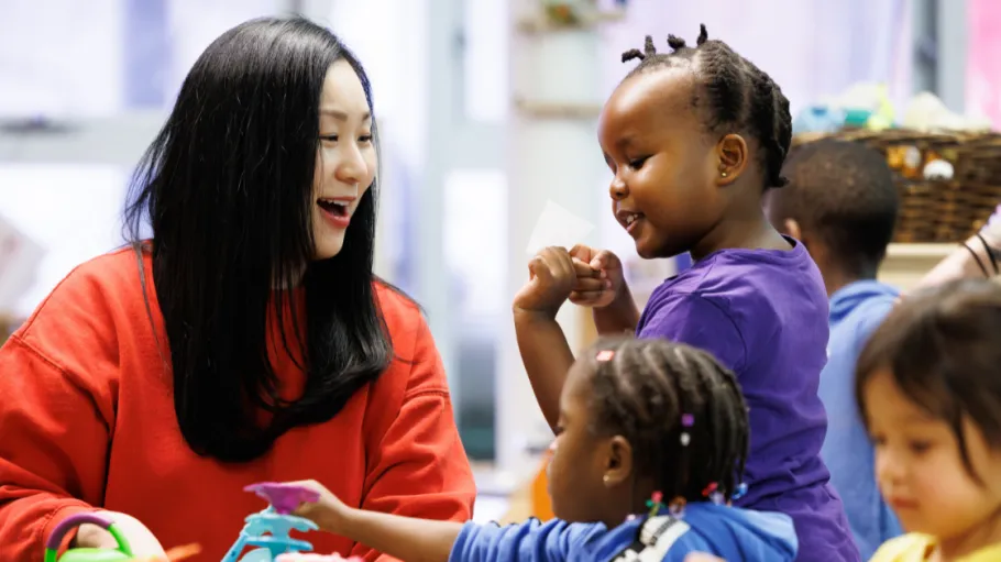 Early Childhood Education student playing with children
