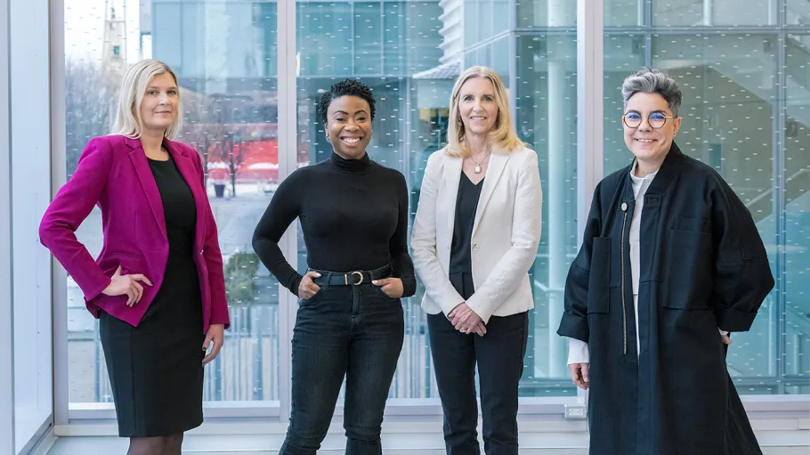 Group photo of Michelle McCollum, Kizzy Rodney, Leslie Quinlan, and Ana Rita Morais at the Waterfront campus