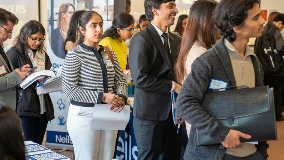 students waiting to register for career fair