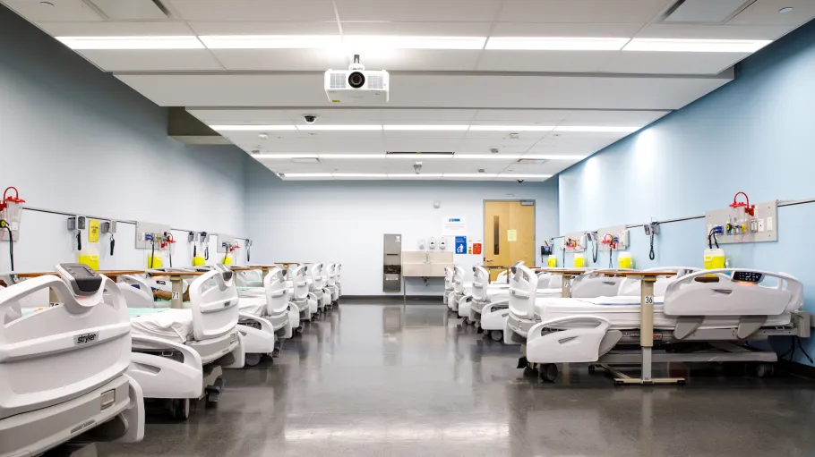 The college's Simulation Centre features hospital ward environments for student learning. 