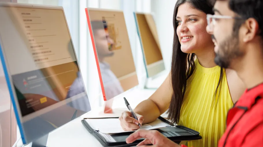 Two students working on a project together