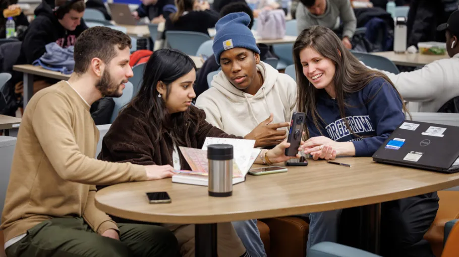Four students working on a project