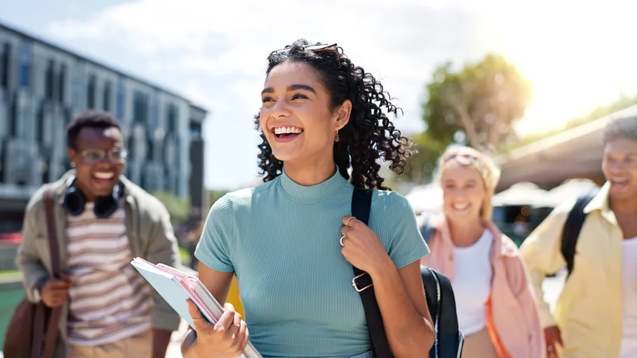 Students walking outside of an academic building