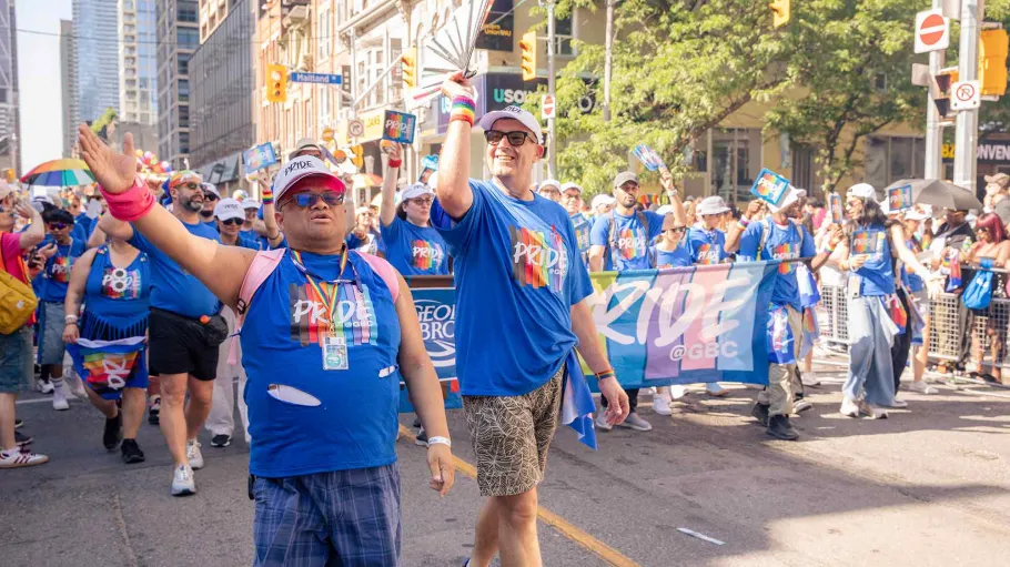 Michael Herrera leading GBC Pride parade contingent