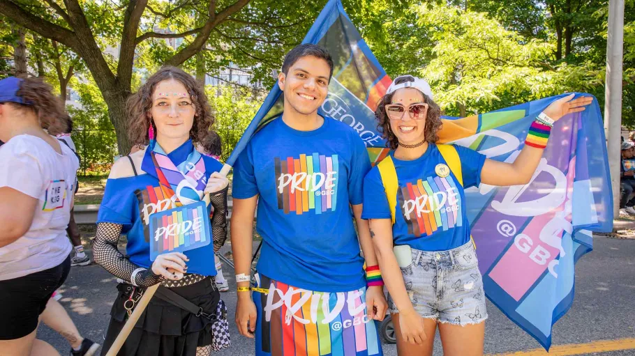 Three GBC Pride Parade participants