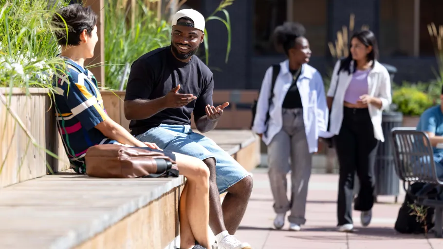 Students talking and walking