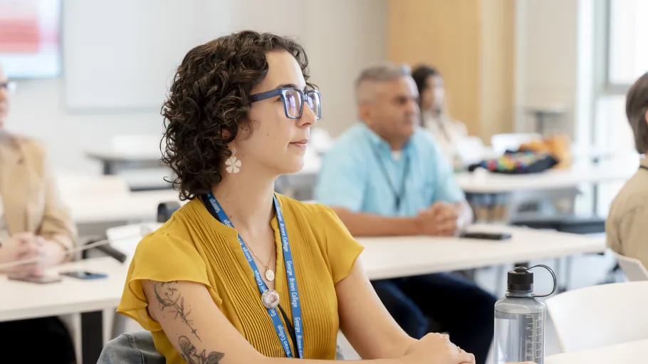 Faculty sitting in a classroom