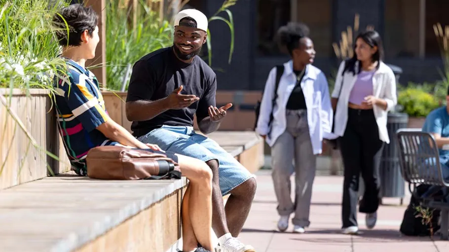Students talking and walking