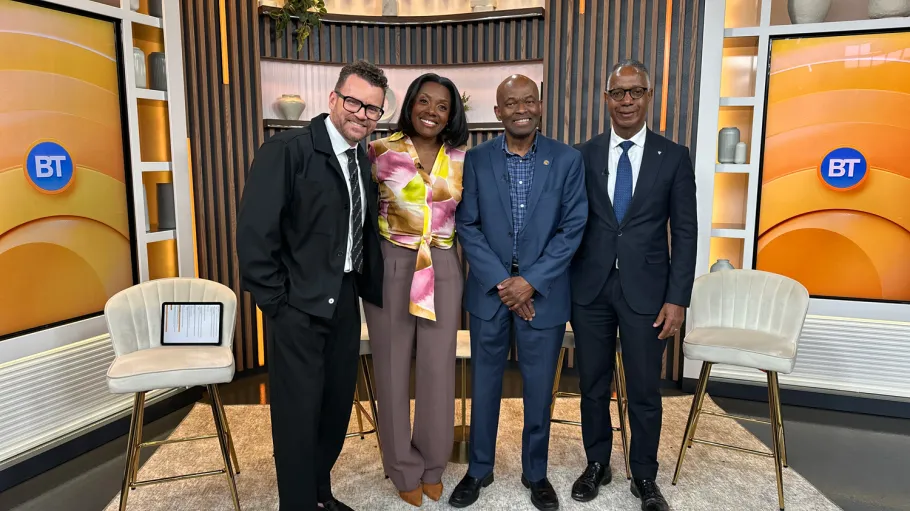 President Fearon joins Breakfast Television for Men's Health Month and poses with the hosts on set.