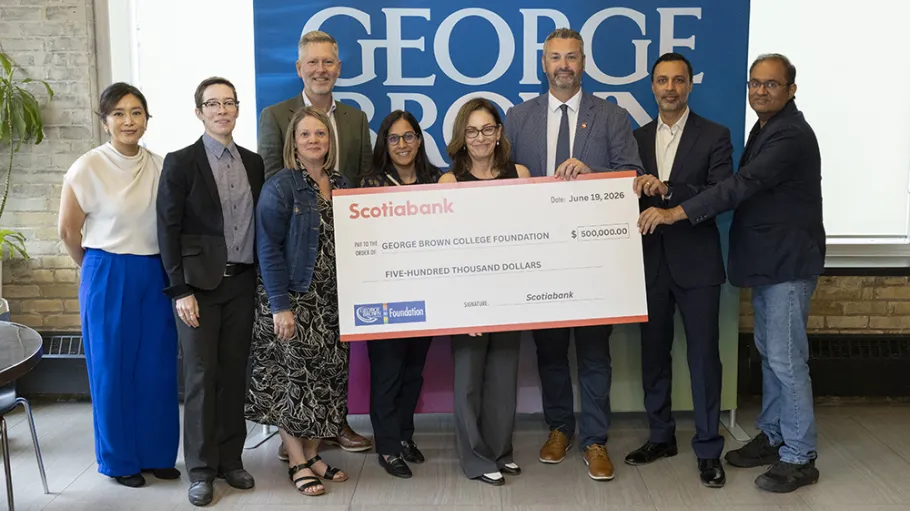 George Brown Polytechnic and Scotiabank representatives pose with a ceremonial $500,000 cheque supporting the George Brown College Foundation and the ReNEW Career Readiness Program.