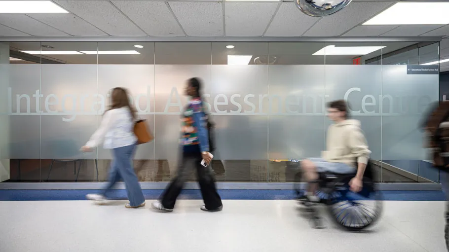 People walking in front of the assessment centre