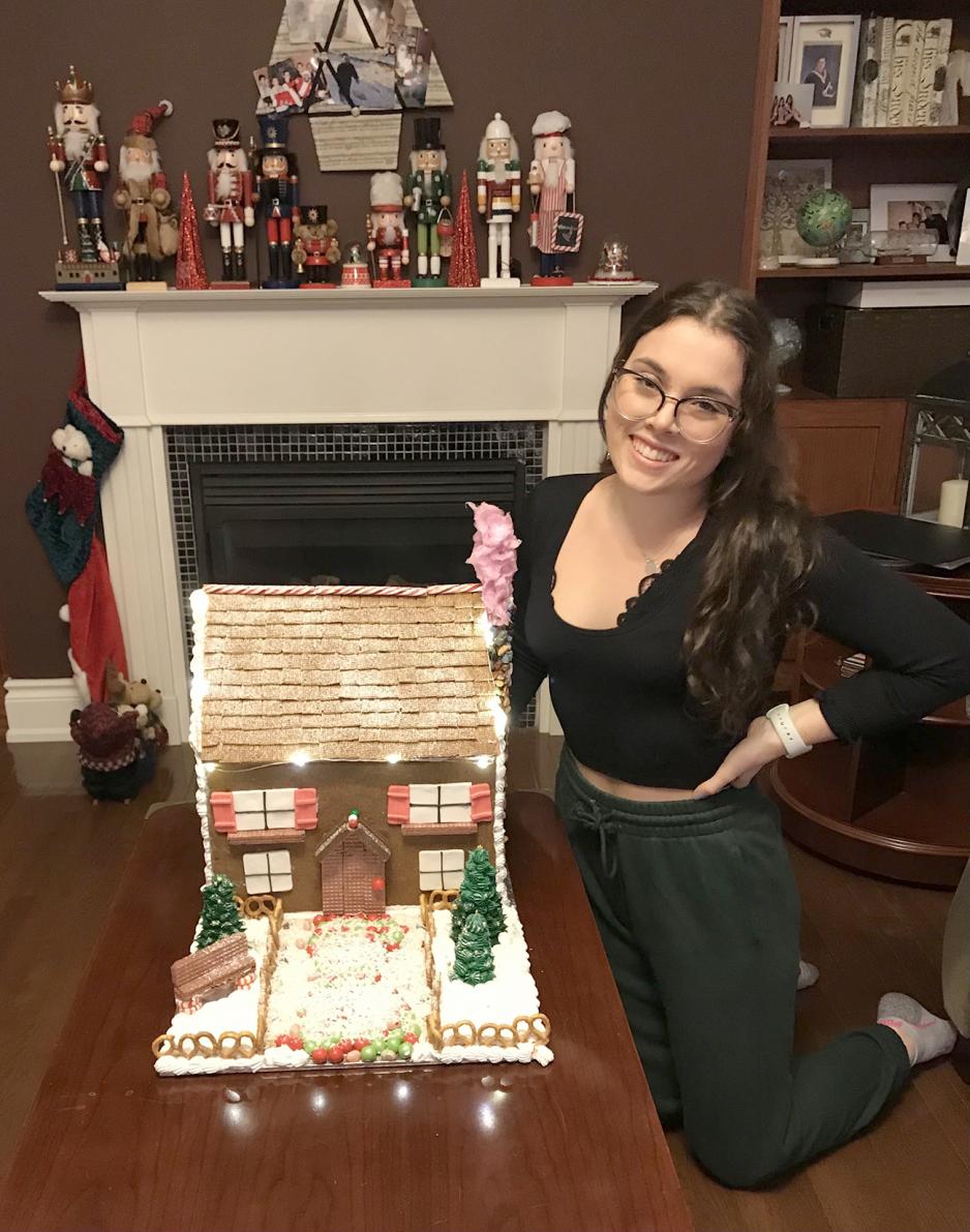 Chef school student Mikayla Hanna with gingerbread house, November 2020