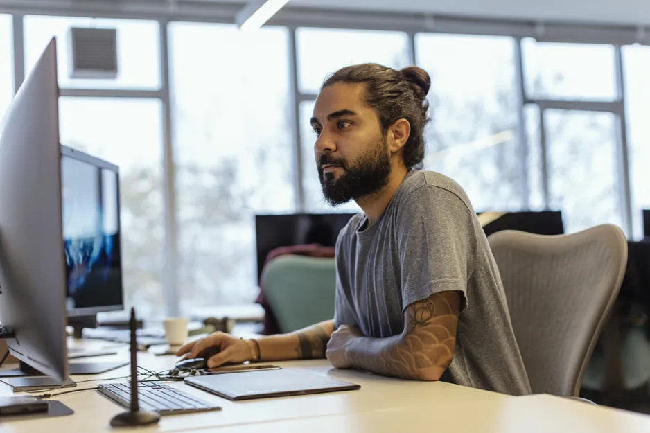 student working at a computer