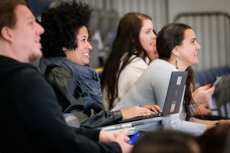 A row of four employees 