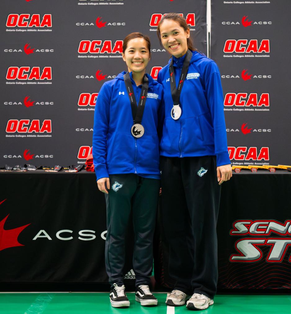 Monique Lee and Giselle Kochapanya with medals