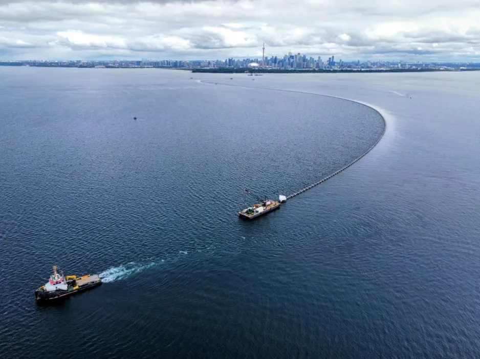 A new, three-kilometre intake pipe is floated out into Lake Ontario that will add significant capacity to the city’s deep lake water cooling system. George Brown College’s Limberlost Place will be connected to this unique-to-Toronto sustainable energy innovation. Photo credit: Enwave Energy Corp.