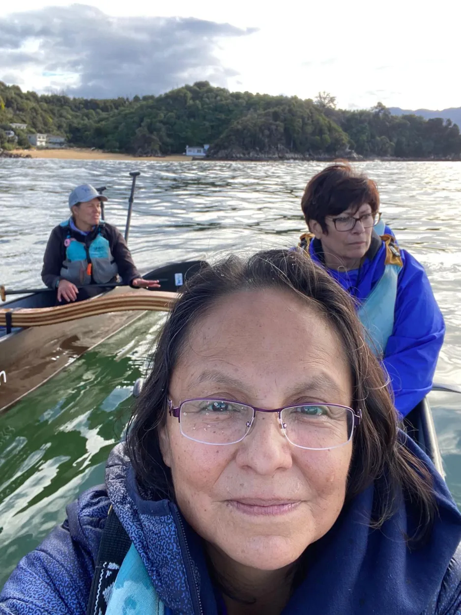 Three people in a boat