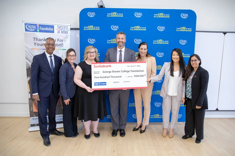 Representatives from Scotiabank and George Brown College holding a ceremonial cheque