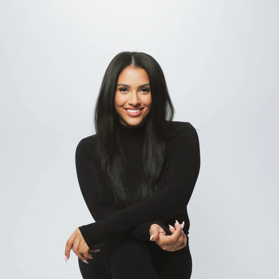 Danielle Spencer seated and smiling