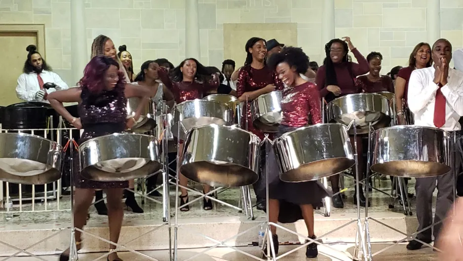 A group of steel pan drummers perform