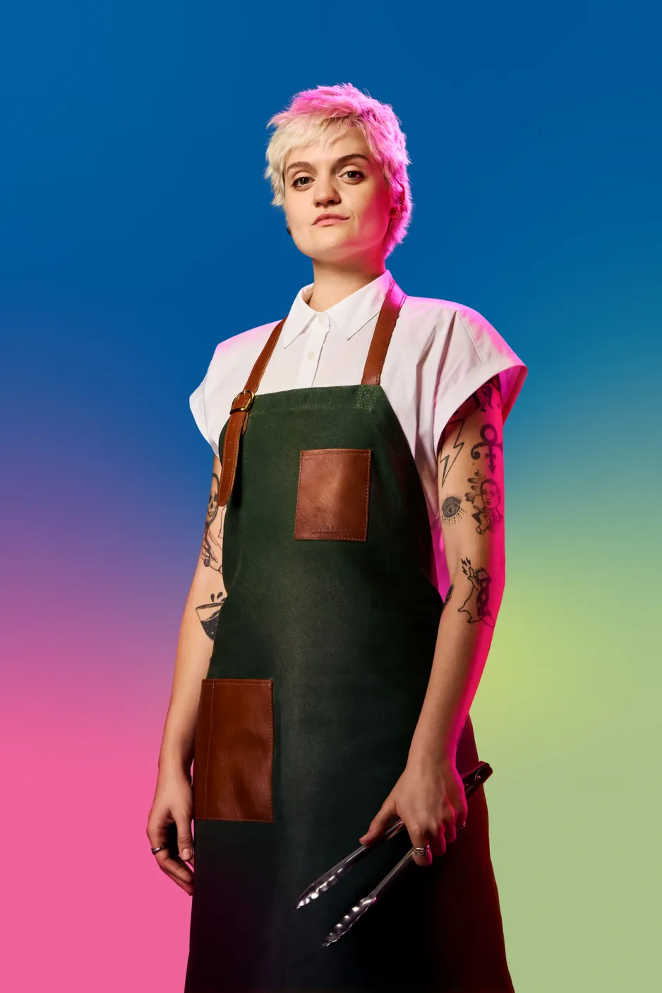 A woman with an apron holding tongs stands against a colourful blue gradient