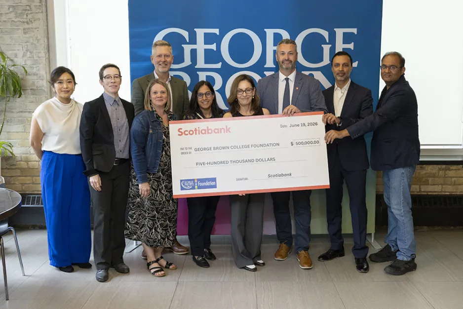 George Brown Polytechnic and Scotiabank representatives pose with a ceremonial $500,000 cheque supporting the George Brown College Foundation and the ReNEW Career Readiness Program.